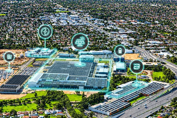 Aerial view of an energy precinct with solar, battery and EV charging infrastructure